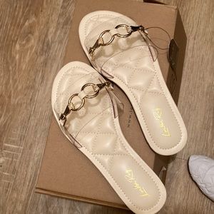 Elegant Cream Sandals with Gold Accents